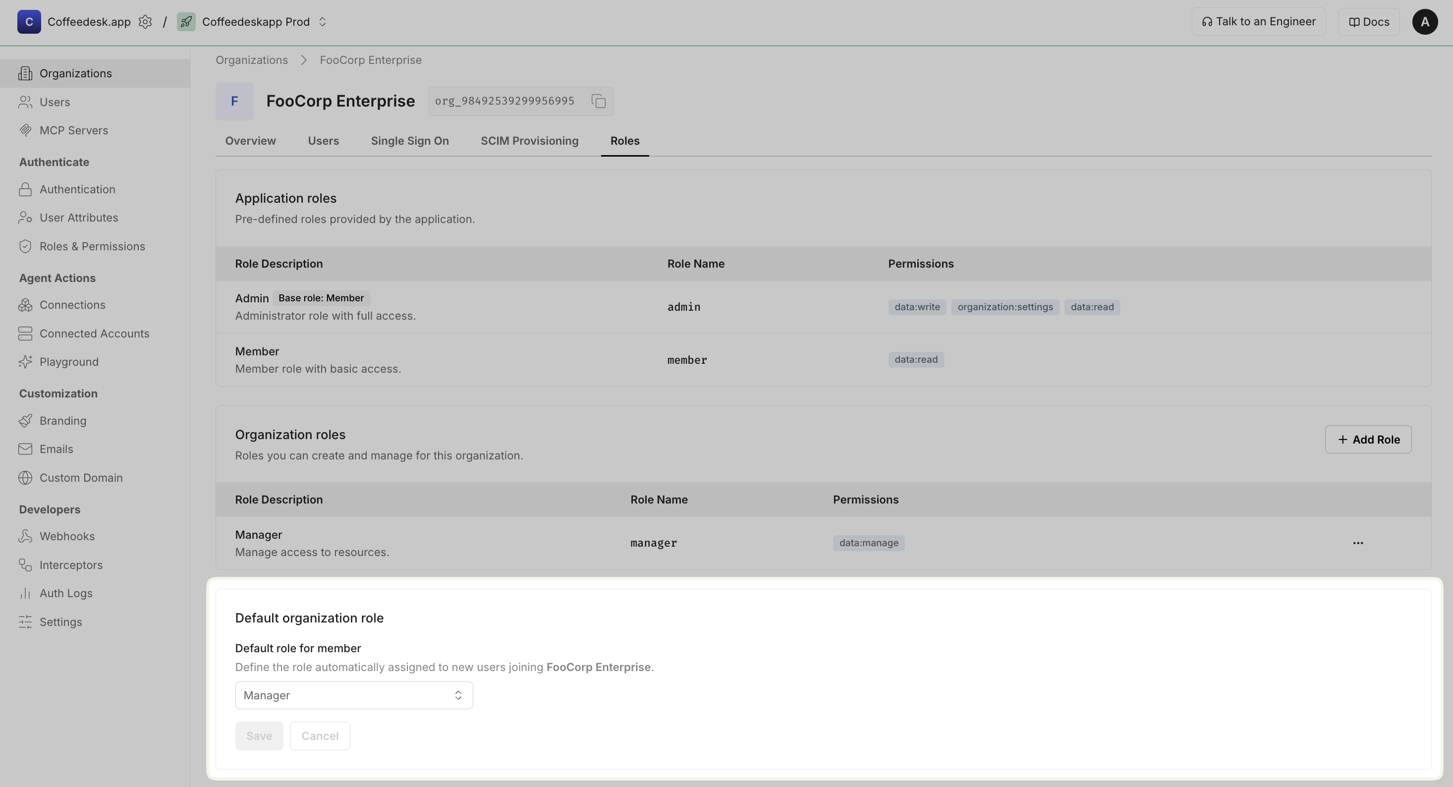 Organization roles view with a Default organization role dropdown for assigning a role to new users joining that organization